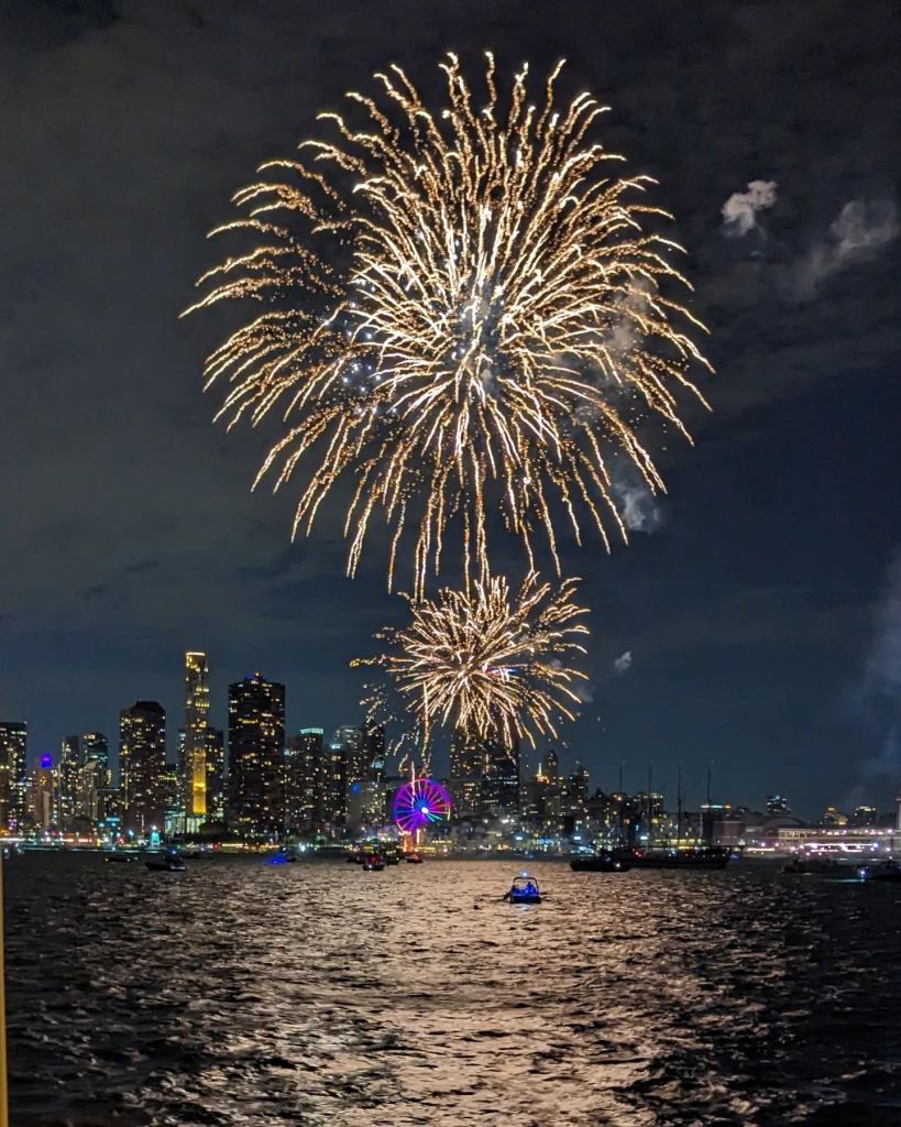 Fireworks over a lake.